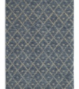 A subtle, hushed pattern of diamonds and dots against an exquisite indigo ground enhances any decor with soft-textured style. This statement-making rug from Karastan is woven from 100% premium worsted 2-ply wool for a soft hand and long-lasting wear.