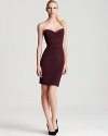 A Zac Posen strapless dress hugs your every curve and flaunts sculpting seams with cut-out detail for head-turning style. With a high back slit, this structured silhouette makes cocktails an alluring affair.