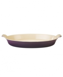 Enhance hot comfort foods like mac n' cheese, potatoes au gratin and peach cobbler with this versatile – and beautifully hued – baking dish from Le Creuset. A wide, shallow shape maximizes surface area to encourage browning and also cooks foods flawlessly on your stovetop. Great for marinating, too!