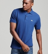 Lacoste's modern classic looks better than ever. The 2 button polo with the iconic alligator logo at the left chest.