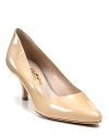 A pointed toe adds to the timeless style of these patent leather kitten heels.