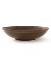 Rich chocolate hues and a dashing coupe shape give this collection from Calvin Klein undeniably chic style. The Tonal Edge dinnerware features lush brown glaze over fine porcelain with a matte bisque rim to create a duality of color.