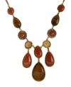 Bohemian bliss. Lucky Brand's earthy Y necklace features semi-precious teardrop and round-cut tiger's eye and gold sandstone with plastic and glass beaded accents. Set in gold tone mixed metal. Approximate length: 21 inches + 2-inch extender. Approximate drop: 3-3/8 inches.