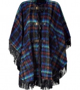 Stylish cape in a multicolored wool blend - Cool chunky knit in a blanket plaid look - Elegant, leather strap fasteners - Casual  trendy poncho style - Draped, asymmetrical handkerchief front with fringed edge - Pair with skinny jeans or leather leggings and booties or boots