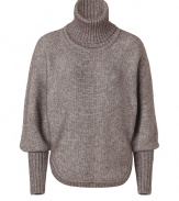 Exquisitely soft and equally chic, Antonia Zanders oversized turtleneck pullover lends a cool modern finish to every outfit - Ribbed turtleneck, long bishop sleeves, ribbed cuffs, rounded hemline, cabled back - Straight silhouette - Team with chunky jewelry and figure-hugging skinny trousers