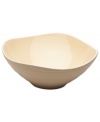 With the look of hand-thrown pottery in hard-wearing stoneware, the Swirl square vegetable bowl from Mikasa enhances casual meals with fuss-free elegance. A matte finish with glazed accents adds stylish distinction to a serene tan hue.