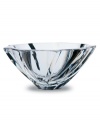 Simply elegant with fine asymmetrical lines. This crystal bowl from Baccarat is the perfect vessel for cut flowers and marbleized pebbles. A very special gift for the bride to be.