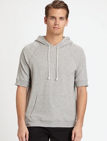 Sporty, hooded pullover perfect for casual weekend wear, in finely blended cotton knit for added warmth and comfort.Attached drawstring hoodFront kangaroo pockets95% cotton/5% polyurethaneMachine washImported