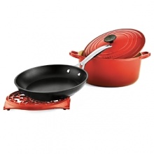 Exclusive to Bloomingdale's, this four piece cookware set from Le Creuset includes a 5.5 quart round french oven with a lid and cast iron trivet, along with a 9.5 forged hard anodized fry pan, one of the newest additions to the Le Creuset collection.