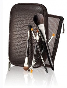 Brush up on beauty this holiday season with this must-have Deluxe Travel Brush Collection for flawless makeup application. Perfect for the on-the-go woman, this sleek brush case features a hard shell design with 2 pockets and a removable mesh pouch that houses a combination of 9 professional brushes for face, cheeks, eyes and brows. Set includes: Secret Camouflage powder; All Over Eye Colour/pony tail; Flat Eye Liner/smudge; Brow Definer/brow grooming and a full-size Cheek Colour brush.