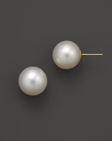 Elegant freshwater pearls, set in 14K. yellow gold.