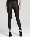 A leather finish imbues these MICHAEL Michael Kors leggings with downtown edge. Slip an airy blouse into the sleek style for a daring yet demure look.