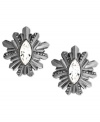 Beautiful bursts. This pair of stud earrings from Givenchy is crafted from hematite-tone mixed metal with glass crystals bringing the luster. Approximate drop: 1-1/4 inches.