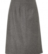 Quietly elegant and effortlessly cool, Jil Sanders grey wool skirt ups the ante on ladylike luxe - Classic slim, A-line silhouette - In a soft, medium-weight virgin wool and angora blend - Knee-length style with decorative seams at waist and side zip - Polished and preppy chic, ideal for pairing with a slim-cut blouse or a button down and long cardigan or pullover