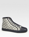 GG Plus with leather trim.Rubber sole with embossed Gucci script logoGucci trademark detailMade in Italy