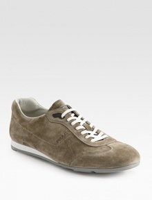 A suede sneaker without equal, finished with double-stitch construction and a debossed logo detail. Leather liningPadded insoleRubber soleMade in Italy