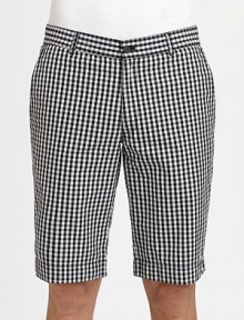 Crisp, cool style you'll look for season after season, tailored in a updated, gingham-print from lightweight, breathable cotton.Flat-front styleSide slash, back welt pocketsInseam, about 12CottonMachine washImported