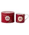 Royal Albert offers a festive twist on the iconic Old Country Roses pattern with a holiday mug mixing shiny gold dots with pink and gold florals. A message about love inside and coordinating tin make it a great gift.