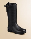 Tall boot with side buckle and inside zipper. Back pull tab Logo detail Leather Rubber sole Imported