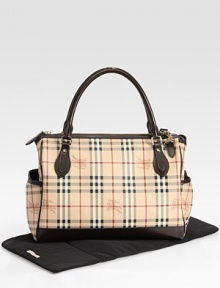 Burberry style for strolling with your little one, designed to hold all the essentials in classic checks.Detachable shoulder strapDouble top handlesTop zip closureTwo outside bottle pockets at each endInside zip pocketChanging padWipe-clean liningPVCAbout 15¾W X 11¾H X 7DMade in Italy