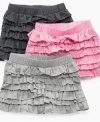 Ruffle some feathers. She'll get attention in this super sweet ruffled skirt from DKNY.