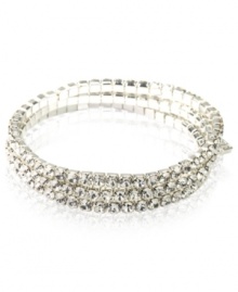 Every girl loves a little glamour. This gorgeous Givenchy bracelet features three rows of round-cut crystal set in silver tone mixed metal. Bracelet stretches to fit wrist. Approximate diameter: 2-1/4 inches.