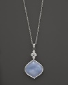 Faceted white sapphire and lavender chalcedony pendant set in sterling silver. By Elizabeth Showers.