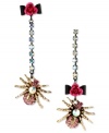 Enter Betsey Johnson's web of influence with this set of drop earrings, featuring a spider motif. Crafted from gold-tone mixed metal and adorned with flower details and glass crystal accents, the earrings are eight-legged friends to enjoy. Approximate drop: 2-1/4 inches.