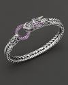 Eastern elements inform John Hardy's dragon head bracelet, featuring a polished silver link band and dragon head clasp with amethyst.