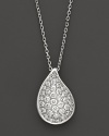 Diamonds set in a 14K. white gold teardrop pendant.