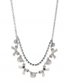 Get frilly and flirtatious in Betsey Johnson's chic frontal necklace. Crafted in silver tone mixed metal, featuring two tiers of Czech crystals, ribbons and glass stones. Approximate length: 15 inches + 3-inch extender. Approximate drop: 3 inches.