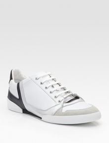 Sleek and sporty sneakers constructed in leather with patent and suede trim. Padded insole Rubber sole Made in Italy 