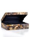 Raw mother-of-pearl chips give this jewelry box a rustic edge that's straight from the sea. Featuring a mirror inside the lid and lined interior with compartments for rings, bracelets and more.