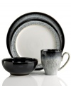 Sturdy and stylish, Denby's Halo place settings move seamlessly from oven to table in distinct stoneware shapes. Its intriguing fade from black to white sets the tone for contemporary-cool casual dining.