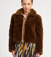 This plush faux fur design will lend a luxurious air to any ensemble.Foldover collarFront zipAbout 18 from shoulder to hem70% modacrylic/20% polyester/10% rayonDry cleanMade in Italy of imported fabricModel shown is 5'11 (180cm) wearing US size 4. 