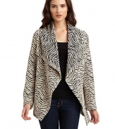 THE LOOKAllover jacquard woven construction with zebra printDraped flap collarOpen frontHandkerchief hemTHE FITAbout 28 from shoulder to hemTHE MATERIALWool/polyamide/polyesterCARE & ORIGINDry cleanImportedModel shown is 5'9½ (176cm) wearing US size Small. 