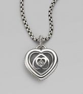 From the Cable Heart Collection. This exquisite cutout heart of fine sterling silver features the iconic logo at its center. Sterling silver Width, about 1 Imported 