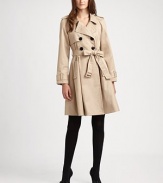 A cotton trenchcoat with feminine details and a waist-defining self-tie belt.Notched collarButton frontSelf-tie beltFully linedAbout 38 from shoulder to hemCottonDry cleanImported Model shown is 5'10 (177cm) wearing US size 4. 