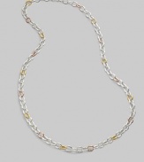 A long chain of multi-toned, water textured links that can be wrap around the neck.Sterling silver 18K gold overlay Length, about 42 Lobster clasp closure Made in USA 