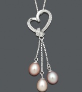 Pretty enough for a princess. This cut-out heart pendant features a delightful asymmetrical design dusted with diamond accents. Pale pastel cultured freshwater pearls (6-7 mm) hang from three delicate chains. Approximate length: 18 inches Approximate drop: 2 inches.