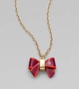 A sweet colorblocked bow on a long goldtone link chain. Acetate10K goldplated brassLength, about 15½Pendant size, about 1 Spring ring closureImported 