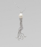 A baroque pearl with a sterling silver tassel on a sterling silver chain. 16mm baroque white organic man-made pearl Length, about 36 Sterling silver Lobster clasp closure Imported 