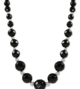 Beautiful in black. Rich onyx (6-12 mm) stands out on this sterling silver necklace with rhodium-plated sparkle beads adding a lustrous touch. Approximate length: 18 inches.