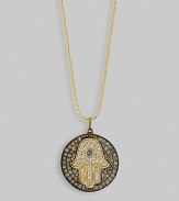 The hamsa, or open hand, a graceful symbol of protection in many cultures, becomes a shimmering necklace, set with diamonds and a single sapphire, on a diamond pavé medallion hanging from a gold ball chain. Diamonds, 0.43 tcw Sapphire, 0.05 ct 14k yellow gold Chain length, about 16 Medallion diameter, about ½ Lobster clasp Imported