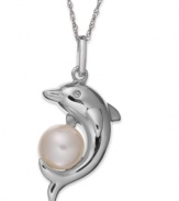 Fun and fashion-forward, this dolphin pendant features a cultured freshwater pearl (8-1/2-9 mm) and diamond accents for a stunning look. Crafted from sterling silver. Approximate length: 18 inches. Approximate drop: 1-1/4 inches.