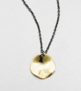 From the Notte Collection. A modern 18k gold disc pendant on a blackened sterling silver link chain. 18k goldBlackened sterling silverLength, about 16-18 adjustablePendant size, about .8Lobster clasp closureImported 