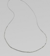 Delicate, faceted glass beads compliment the supple metallic leather cord. Glass beadsLeather cordLength, about 53½Slip-on styleImported 