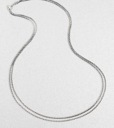 From the Chain collection. Elegant yet sturdy, this double strand of sterling silver features a 14k yellow gold logo at the clasp.Sterling silver 14k yellow gold Length, about 18 when doubled Lobster clasp Imported