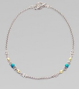 From the Aspasia Collection. A sterling silver chain link with hammered 18K gold, fleur di lis, and turquoise accents.18K yellow gold Turquoise Sterling silver Length, about 18 Toggle closure Made in Greece 