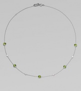 From the Silver Rain Collection. Delicate diamonds and faceted peridot are equally radiant within settings of hammered sterling silver on a graceful chain.Diamonds, .20 tcw Peridot Sterling silver Length, about 18 Lobster clasp Imported